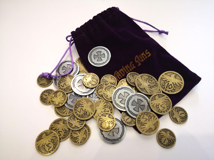Tokens in bronze have 1, 5 and 10 numerical markings and an eagle stamp. The nickel tokens have a wheel or cross-like symbol.  Carrying bag has a draw string and "Fading Suns" logo.